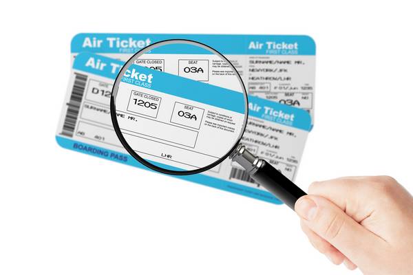magnifying lense air ticket flight
