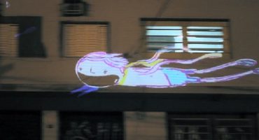 Artists create city street art with tricycles