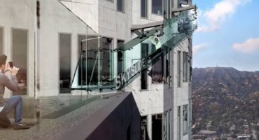 View Los Angeles from the 70th floor of a skyscraper whilst gliding down a glass slide