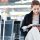 Woman using tablet at airport
