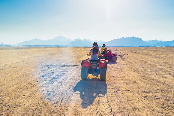 Quad bike riders in the Sahara Desert
